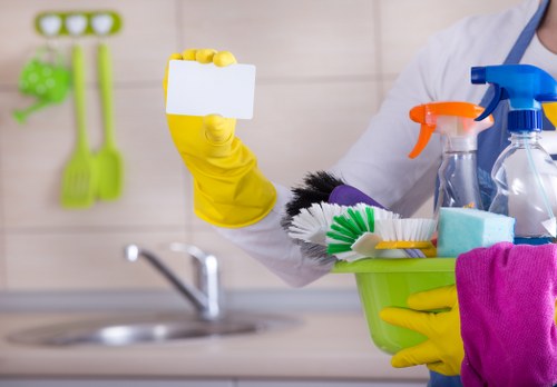 Carpet cleaning technician preparing equipment before a scheduled service