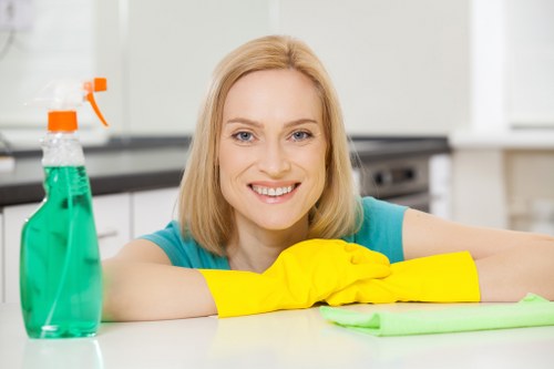 Carpet cleaner in SW10 removing stains from a hallway carpet