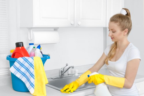 Cleaner restoring a wooden floor surface in SW10